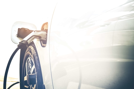 EV charger plugged into electric vehicle